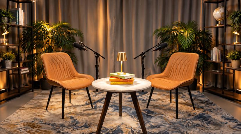 A relaxed easy-chair setup for laid-back interviews and storytelling.
